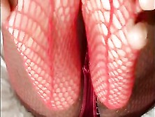 Yellow Toes In Red Fishnets