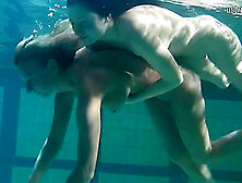 Two Sexy Lassie Fool Around In The Nude While Being Submerged In Water
