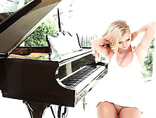 Blonde Doll Gets Horny After Plying The Piano And Starts Wanking Off On The Floor