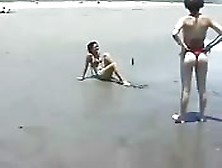 Nude Girls Play On The Beach
