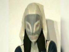 Girl In Blue White Latex Catsuit Mask Plays Breath Play With Rubber Sheet