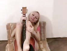 Anne Is Playing On The Guitar Naked