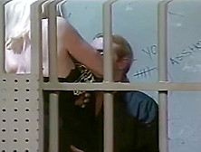 Hot Blond Prison Guard Gives Inmate A Blow Job