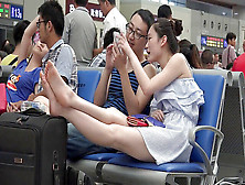 Candid,  Japanese Doll Airing Her Soles And Soles At The Airport