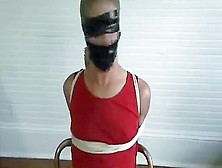 Biker Girl Gets Chair-Tied,  Gagged And Hooded