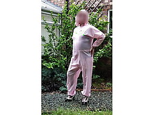 Tranny Slut In Pink Pvc Boiler Suit Outdoors
