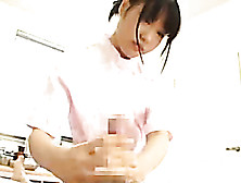 Cute Asian Nurse In Silky Pink Uniform Grabs Her Patient's Dick Then Jacks It Hard.