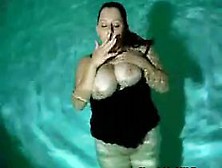 Busty Amateur Milf Sucking Cock In The Pool