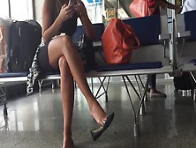Tanned Girl Gets Filmed Dangling Her Shoes On The Train Station