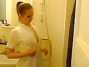 Nurse With Her Wet Uniform In Bathroom
