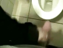Emo Gotch Chick Gives Handjob In Toilet