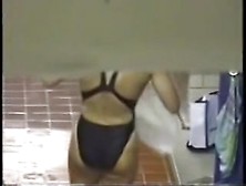 Voyeur Cam In Dress Room Shoots Doll Out Of Swimsuit