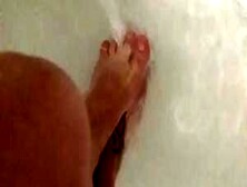 Feet Under Running Water