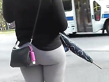 Girl Wearing Gray Leggings Has Nice Round Ass