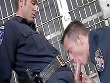 Sexy Policemen Cocksuckers Are Enjoying Oral Sex In