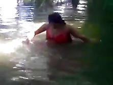 Indian Girl Bathing In The River