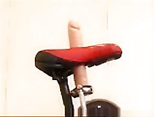 Asian Girl Tests Out The Dildo Bicycle