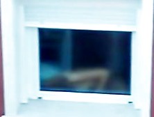 Nude Titted Female Is Seen On Window Voyeur Video