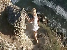 Awesome Blonde Naked On The Beach
