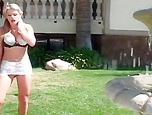 Busty Blonde Takes On Two Cocks Outdoors By The Pool