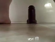 Big Dildo Suction Cupped To The Floor