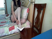 Webcam Showing Chinese Girl Massaging Sprained Ankle In Stockings