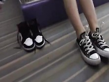 Two Girls Takes Off Shoes And Shows Her Soft Feet