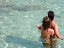 Nude Babe Caught Jerking Her Bf's Cock On The Beach