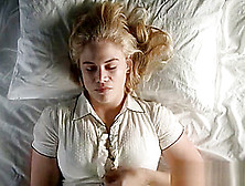 A Blonde With Big Tits Touches Herself In A Bed.