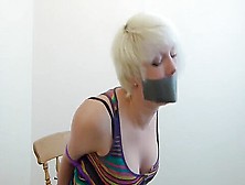 Roped And Tape-Gagged Blond In Escape Challenge