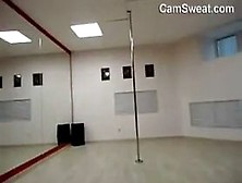 Cam Girl Practices Pole Dancing