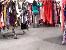 Sensual Babe In Gray Pants Walks Around The Store Jiggling