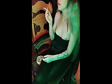 Mistress Smokes A Cigarette