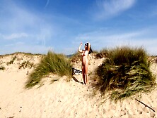 Expressiagirl With Big Tits Sunbathes And Walks Naked On The Beach
