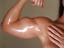 Oily Muscular Female Athlete