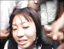 Japanese Beauty Gets A Bukkake In Public