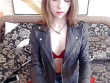 Sexy Blonde Camgirl With Leather Jacket And Jeans Strip