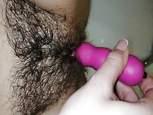 Hairy Vagina Plays With A Vibrator And Gets An Cums In The Bathroom