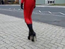 Red Leather Catsuit And 8 Inch Stilletoe Boots