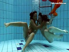 Two Beautiful Girls Swim In The Nude
