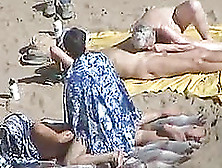 Kinky Couple Doesn't Feel Shy While Making Love On A Nude Beach