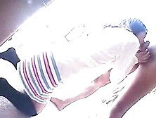 Asian In A Cute Skirt On Her Knees Sucking Cock