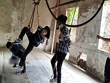 Two Girls Suspended In An Abandoned House