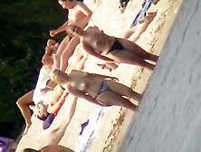 Mature Women With Big Butts Taking Sunbaths On The Beach