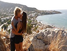 Ravishing Teenie Lovers In Love Passionately Kissing Above The Sea On Crete Island