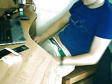 Teen Boy Jerking Off By The Desk While Working Online