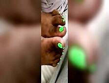 Cream On Bright Green African Feet And Foot