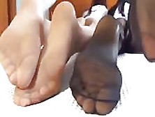Two Pairs Of Feet In Nylon