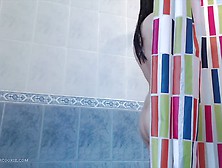 Busty Asian Teen Uses Showerhead