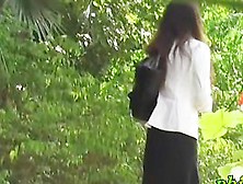 Oriental Businesswoman Gets Very Surprised When Some Guy Grabs Her Clothes